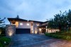Modern home with Exterior, House Building Type, Stone Siding Material, and Tile Roof Material. Casa Gonzalez Herrero Photo 4 of Casa Gonzalez-Herrero