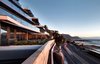 Modern home with Exterior, Apartment Building Type, and Glass Siding Material. The palette is intentionally and carefully controlled and restrained to embrace the
everchanging colours of the sunrise and sunset, which are the real centerpiece and art
show.” - Adam Court Photo of Clifton 301