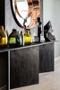 Modern home with Living Room, Pendant Lighting, Light Hardwood Floor, and Console Tables. “All the artwork accessories and objects are from Cape based artisans and add an essential level of layering and local character,” he adds. Photo 6 of Clifton 301