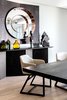Modern home with Dining Room, Pendant Lighting, Light Hardwood Floor, Table, and Chair. The signature Tofu dining chairs accompany the Bison dining table behind which are a bespoke serverin Carbon stained Ash timber, Port mirror and accessories, all by OKHA. Photo 7 of Clifton 301