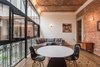 Modern home with Dining Room, Chair, Ceiling Lighting, Wall Lighting, Table, Ceramic Tile Floor, and Desk. Interior apartment Photo 6 of Lirio 7
