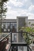 Modern home with Outdoor and Gardens. The concrete volume creates a contrast with the existing structure Photo 11 of Lirio 7
