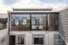 Modern home with Outdoor. Mirrored windowpanes in different angles helps to restore some privacy Photo 13 of Lirio 7