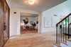 Modern home with Hallway and Light Hardwood Floor. Dorchester Interior Front Entry Photo 6 of The Dorchester Project by Paul + Jo Studio