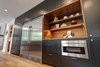 Modern home with Ceiling Lighting, Accent Lighting, and Light Hardwood Floor. Dorchester Interior Kitchen Photo 17 of The Dorchester Project by Paul + Jo Studio