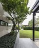 Modern home with Exterior, House Building Type, Stone Siding Material, and Metal Roof Material. View toward existing house Photo 4 of SIRI House