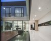 Modern home with Living Room, Porcelain Tile Floor, and Ceiling Lighting. inside and outside 1 Photo 5 of SIRI House