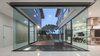 Modern home with Living Room, Ceiling Lighting, and Porcelain Tile Floor. View of courtyard Photo 6 of SIRI House