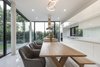 Modern home with Dining Room, Chair, Table, Porcelain Tile Floor, Pendant Lighting, and Ceiling Lighting. Dining and pantry Photo 8 of SIRI House