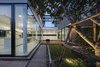 Modern home with Outdoor, Walkways, Grass, Hardscapes, Planters Patio, Porch, Deck, Back Yard, Decking Patio, Porch, Deck, Wood Patio, Porch, Deck, Shrubs, Gardens, Trees, Concrete Patio, Porch, Deck, and Landscape Lighting. View from courtyard toward the house Photo 10 of SIRI House