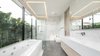 Modern home with Engineered Quartz Counter, Porcelain Tile Floor, Undermount Sink, and Ceiling Lighting. View of master bath 2 Photo 16 of SIRI House