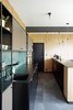 Modern home with Kitchen, Laminate Cabinet, Ceramic Tile Floor, Pendant Lighting, Wood Cabinet, Marble Backsplashe, and Laminate Counter. custom made kitchen Photo 9 of Mountain Apartment in Ore Mountain, Czech Republic