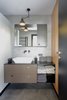 Modern home with Ceiling Lighting and Ceramic Tile Floor. metal mirror with storage - another custom made element Photo 18 of Mountain Apartment in Ore Mountain, Czech Republic