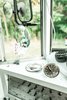 As much as we've completely reinvented this old bus, subtle elements of it's original character remain. The simple dashboard, controls and enormous steering wheel are signs of its age. Photo 8 of The Wild Drive Life Bus modern home