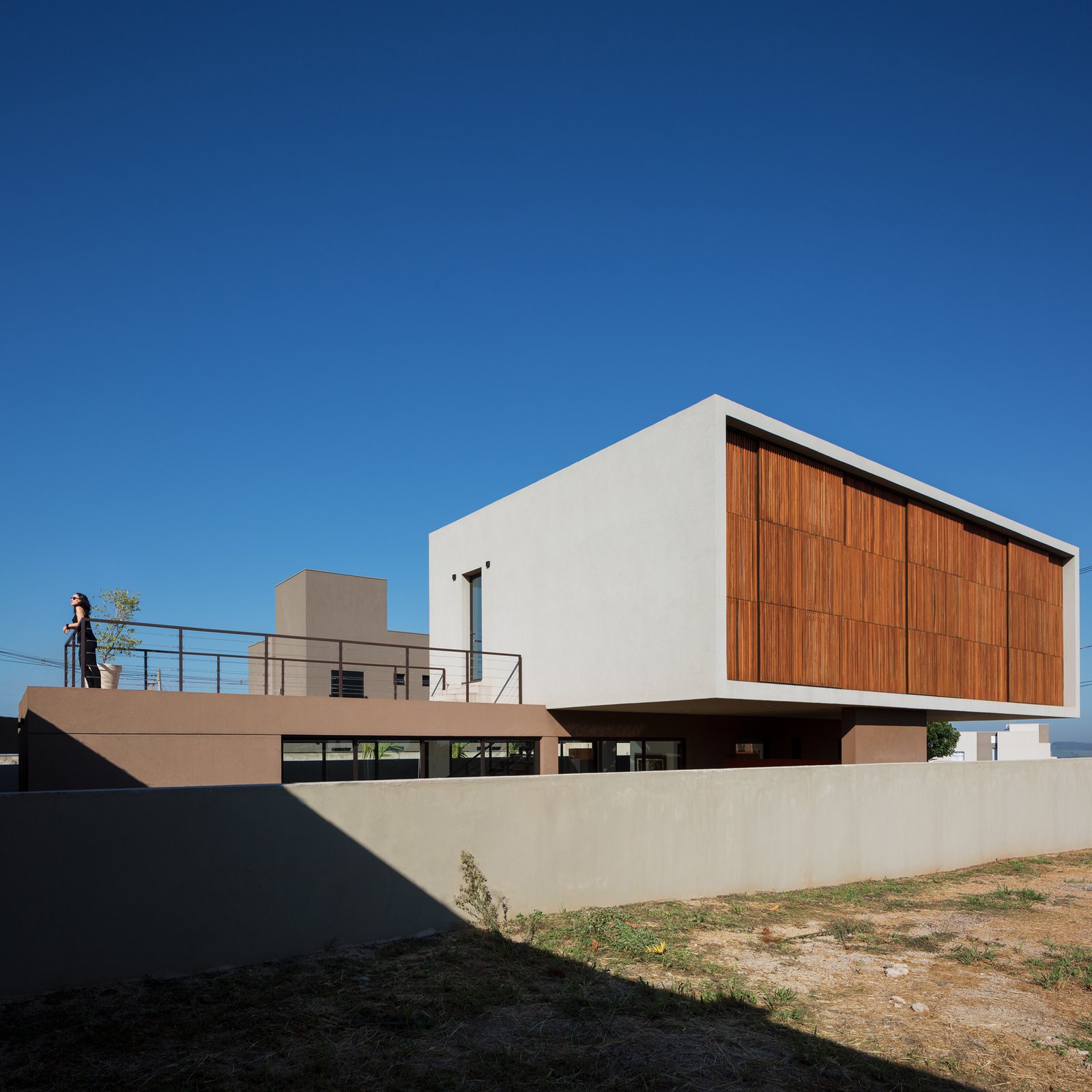 Terrace positioned in the back of the terrain, offering open views.
