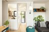 Modern home with Living Room, Sofa, Light Hardwood Floor, and Wall Lighting. The living-room connects with a small studio Photo 8 of remodelled duplex in a contemporary style