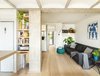 Modern home with Living Room, Light Hardwood Floor, Wall Lighting, and Sofa. living-room Photo 7 of remodelled duplex in a contemporary style