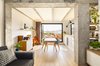 Modern home with Dining Room, Recessed Lighting, Chair, Light Hardwood Floor, Storage, Table, Wall Lighting, Shelves, and Lamps. The living-room and the terrace Photo 19 of remodelled duplex in a contemporary style