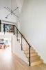 Modern home with Staircase, Metal Railing, Wood Tread, and Glass Railing. Foyer 02 Photo 5 of New Canaan Home