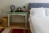 Modern home with Bedroom, Bed, Light Hardwood Floor, Night Stands, Storage, Chair, Recessed Lighting, and Accent Lighting. Master bed Photo 13 of Modern Farmhouse