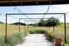 Exterior entertaining area attached to granary Photo 19 of Modern Farmhouse modern home
