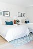 Modern home with Bedroom, Night Stands, Recessed Lighting, Light Hardwood Floor, and Bed. Downstairs guest bedroom Photo 8 of Brand New Renovation, Designer Furnishings Near Laguna Main Beach & Village