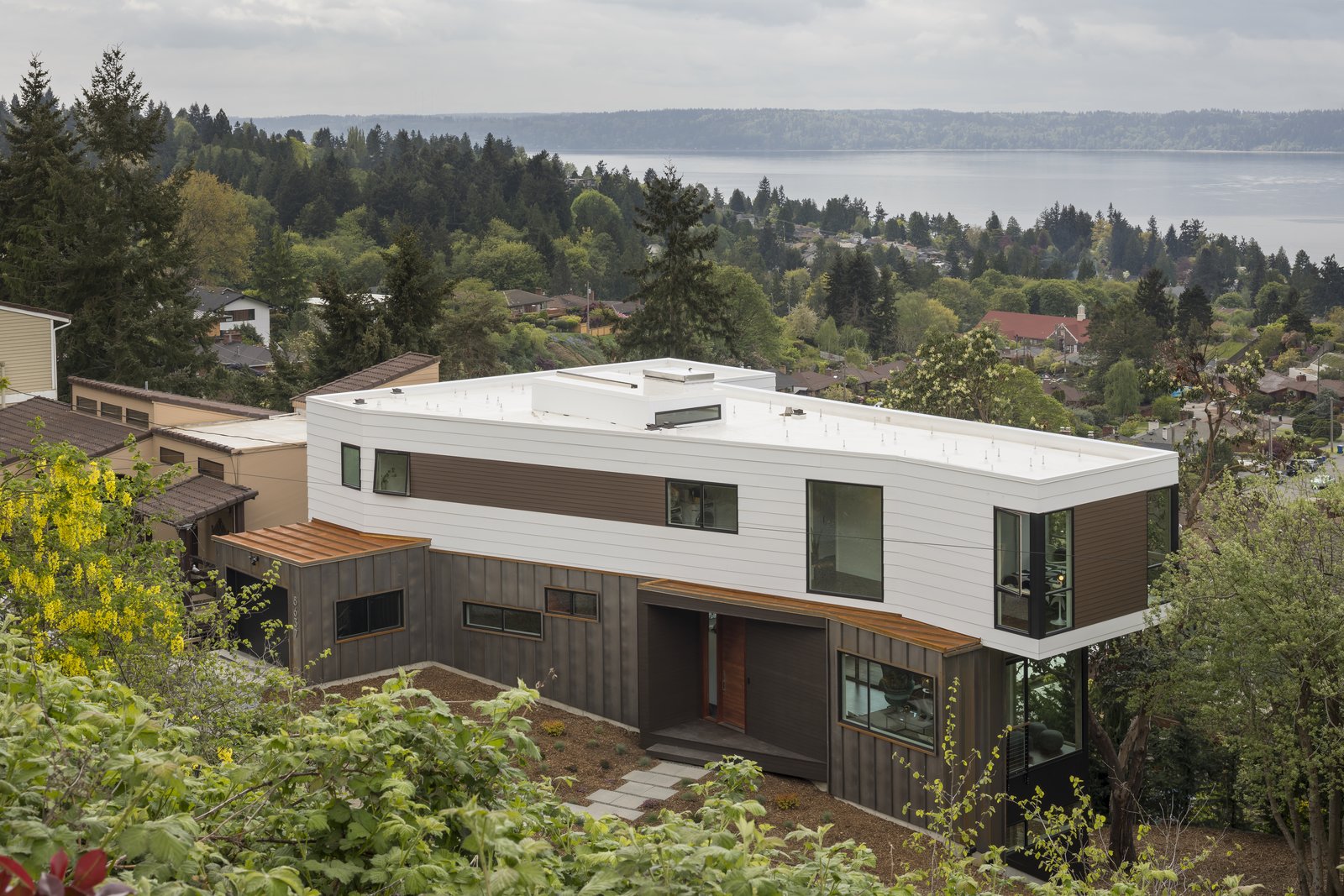 Neighborhood looks towards the site and house anchoring the landscape.