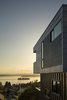 Modern home with Exterior, Concrete Siding Material, Wood Siding Material, Prefab Building Type, House Building Type, Tile Roof Material, Flat RoofLine, and Metal Siding Material. The upper volume reaches for the infinite view. Photo 16 of Farwell