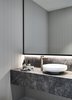 Modern home with Bath Room, Marble Counter, Ceiling Lighting, Accent Lighting, Light Hardwood Floor, Vessel Sink, and Pendant Lighting. Canny 'The New' Powder Room Photo 2 of The New