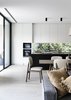 Modern home with Dining Room, Chair, Table, and Light Hardwood Floor. Canny 'The New' Kitchen / Dining Photo of The New
