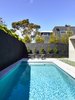 Modern home with Outdoor, Trees, Back Yard, Grass, and Large Pools, Tubs, Shower. Canny 'The New' Pool Photo 7 of The New