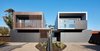 Modern home with Exterior, Beach House Building Type, Metal Roof Material, Flat RoofLine, Wood Siding Material, Glass Siding Material, and House Building Type. McCrae House 1 & 2 Photo of McCrae House 1 & 2