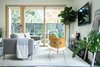Modern home with Living Room, Concrete Floor, Table Lighting, Sofa, Ceiling Lighting, and Chair. The cozy living room has Netflix ready for you to binge your favorite series. Photo 10 of 111 House