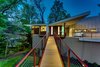 Modern home with Exterior, Metal Siding Material, House Building Type, Butterfly RoofLine, and Metal Roof Material. Main Entrance Photo of Jafari Residence