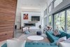 Modern home with Living Room, Ceiling Lighting, Concrete Floor, Sectional, and Gas Burning Fireplace. Great Room Photo 4 of Jafari Residence