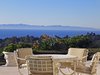 Modern home with Outdoor, Back Yard, and Large Patio, Porch, Deck. The home, built parallel to the ocean and at an ideal 600-foot elevation, allows unobstructed panoramic Pacific vistas over a verdant carpet of treetops. Photo 3 of The Modernist Island in a Spanish Sea: A Groundbreaking Residential Design by James Morris, AIA