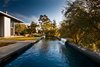 Modern home with Outdoor, Back Yard, Lap Pools, Tubs, Shower, Shrubs, and Trees. The mesmerizing approximately 50’ ozonated lap pool is located on one end of the grounds. Most of us are familiar with chlorine sanitizing systems, but the truth is that ozone for swimming pools has been in use for well over 50 years in Europe. It has only been over the past decade in which American pool owners are beginning to recognize this unique sanitizing system’s merits as concerns about chlorine continue to rise. When used properly, ozone will drastically cut back the need to add chemicals to your pool. Photo 12 of Iconic Modernism by Barton Myers