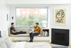 Modern home with Bedroom, Bed, and Light Hardwood Floor. Master Bedroom Window Seat Photo of Throckmorton Renovation
