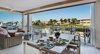 Modern home with Outdoor, Stone Patio, Porch, Deck, Side Yard, Trees, Large Patio, Porch, Deck, Grass, Shrubs, and Walkways. 121 Marina Ocean Reef outdoor dining area Photo 2 of 121 Marina Ocean Reef