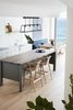 Original BTC's Diner 125 pendant in weathered brass. The light has 4 lamp holders, with glass on 4 sides and an open top and base. Photo 3 of Bronte Beach Marine Residence modern home
