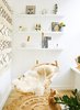 Modern home with Living Room, Light Hardwood Floor, and Chair. A window nook allows for a small seating area and a vignette for the owner's collection of small tchotchkes. Photo 4 of Crosby Loft