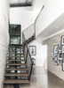 Modern home with Staircase, Metal Tread, Wood Tread, and Metal Railing. Entry Foyer Detail 02 Photo 7 of 400 SOLA