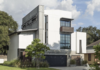 Modern home with Exterior, Shed RoofLine, Concrete Siding Material, House Building Type, Stucco Siding Material, Metal Roof Material, and Flat RoofLine. Front Facade Photo 11 of 400 SOLA