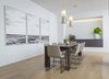 Modern home with Dining Room, Light Hardwood Floor, Ceiling Lighting, Storage, Chair, Table, Recessed Lighting, and Bar. Dining Room Photo 8 of Indian Hill Residence