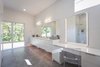 Modern home with Ceiling Lighting, Recessed Lighting, and Drop In Sink. Master Ensuite Bathroom Photo 14 of Indian Hill Residence
