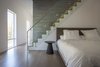 Modern home with Light Hardwood Floor and Ceiling Lighting. Master Suite Photo 13 of Indian Hill Residence