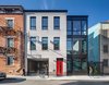 Modern home with Exterior, Brick Siding Material, Metal Siding Material, Flat RoofLine, Metal Roof Material, and House Building Type. New exterior facade while modern, nods its head to the historic character of the neighbourhood Photo of Pleasant St. Urban Abode