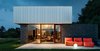 Modern home with Exterior, Concrete Siding Material, Metal Siding Material, House Building Type, Flat RoofLine, and Glass Siding Material. Rear Exterior Patio Photo of Catskills House