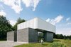 Modern home with Exterior, House Building Type, Glass Siding Material, Flat RoofLine, Concrete Siding Material, and Metal Siding Material. Front Exterior Photo 4 of Catskills House