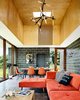 Modern home with Living Room, Sectional, Pendant Lighting, Concrete Floor, and Coffee Tables. Living Dining Room Photo 6 of Catskills House